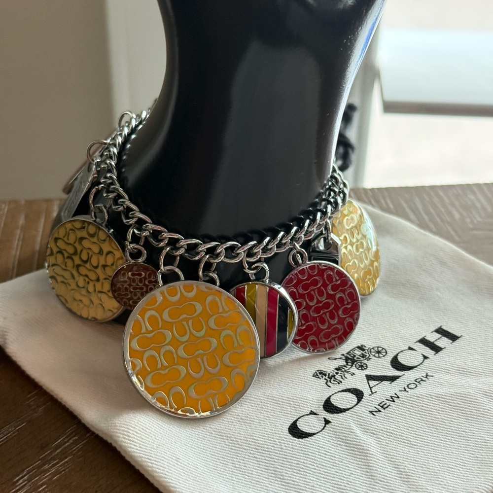 Coach Rare silver toned Gold&Red enamel Charm Bracelet NWOT w branded dust bag